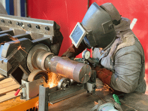 Recuperación de punta de eje en machacadora.